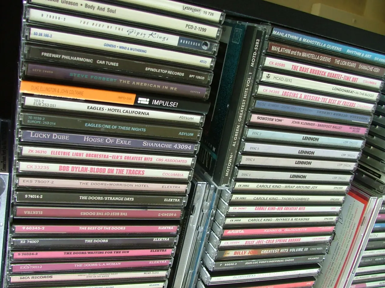 A rack packed with rows of CDs