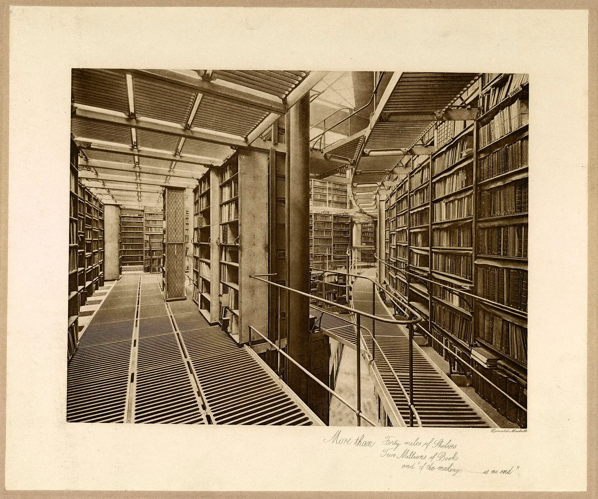 Old photograph of towering library stacks filled with books